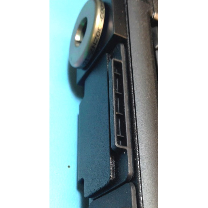 V110 notebook IO port cover shown installed